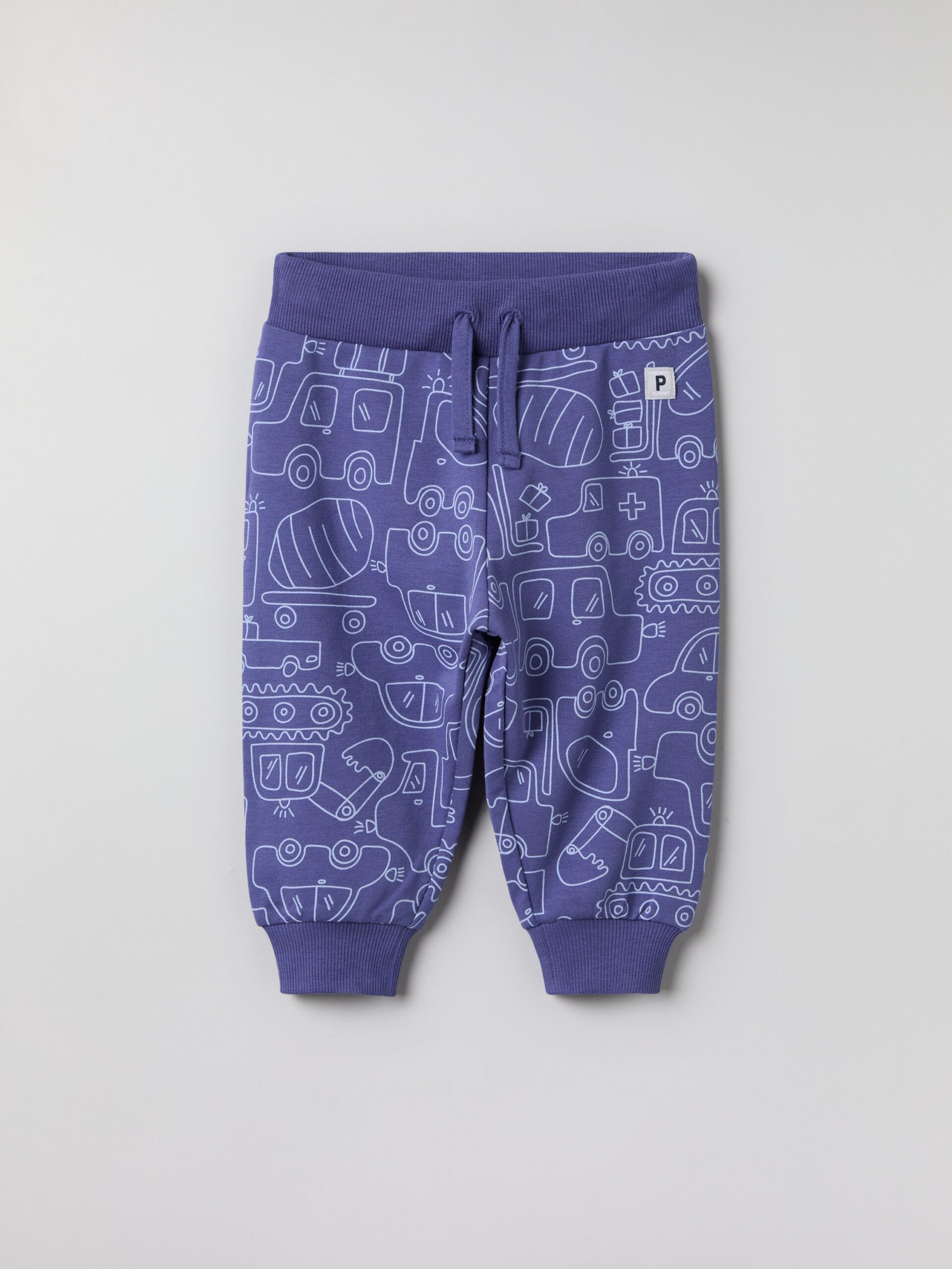 Collegehousut harjatulla sisäpinnalla ja autokuviolla