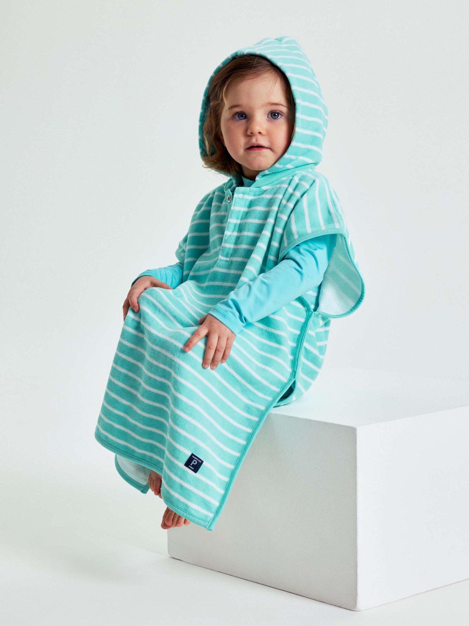 Raidallinen kylpyponcho