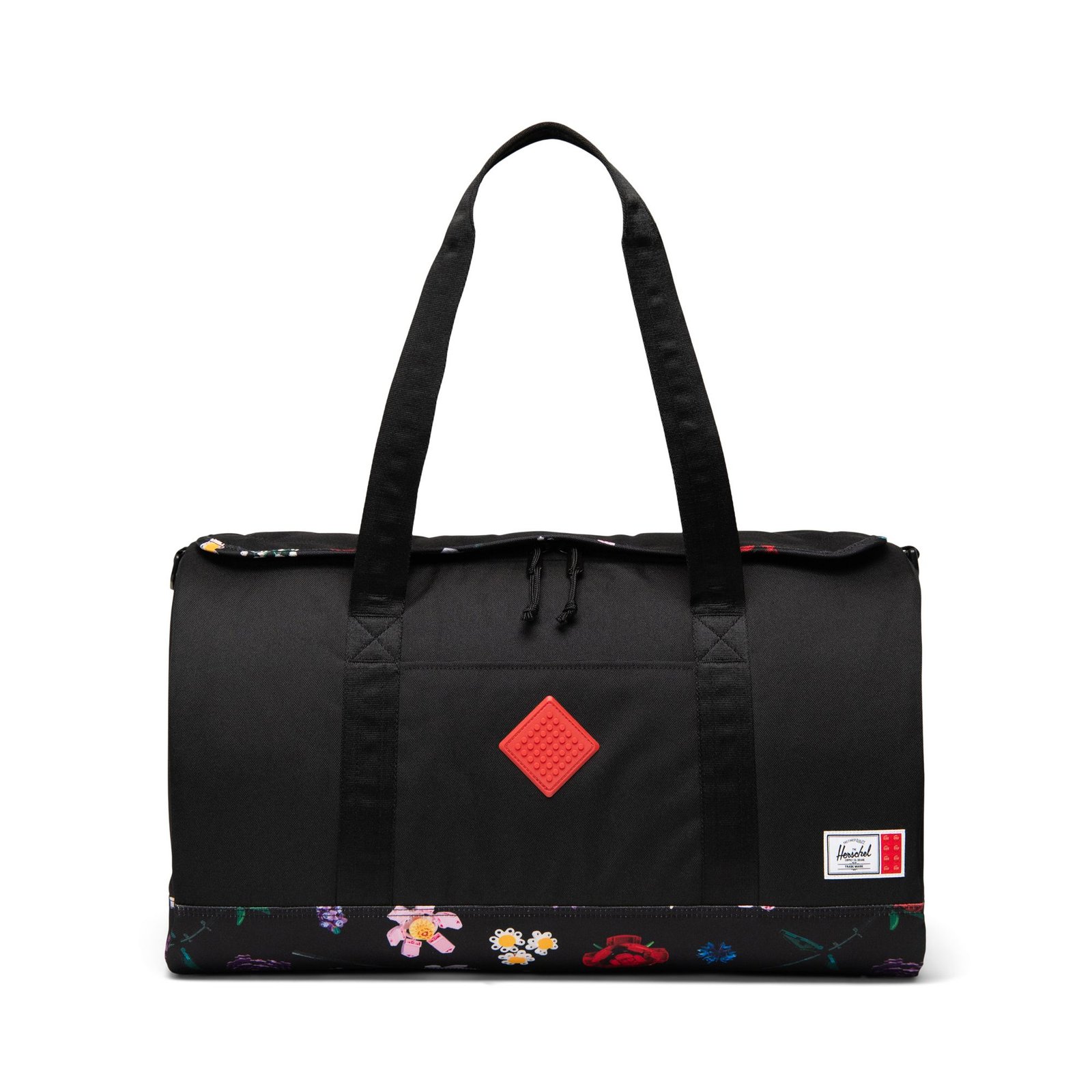 Herschel Heritage ‑putkikassi - musta/kukkakuvio